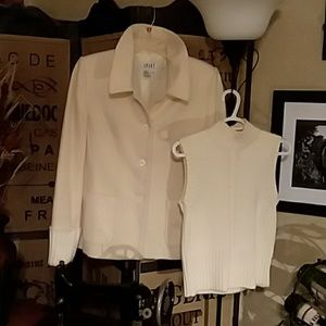 This is a cashmere blazer with a sleeveless merino